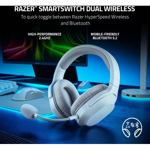Razer Barracuda X Mercury white wireless gaming headset with microphone on a desk setup