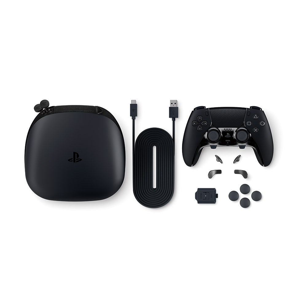 Gaming console, controller, and accessories on a white background